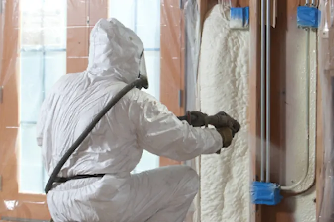 Spray foam insulation being applied